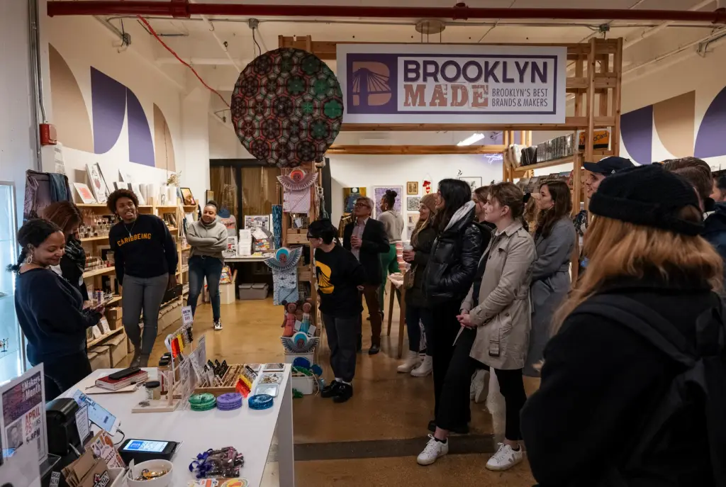 a group of people standing in a room